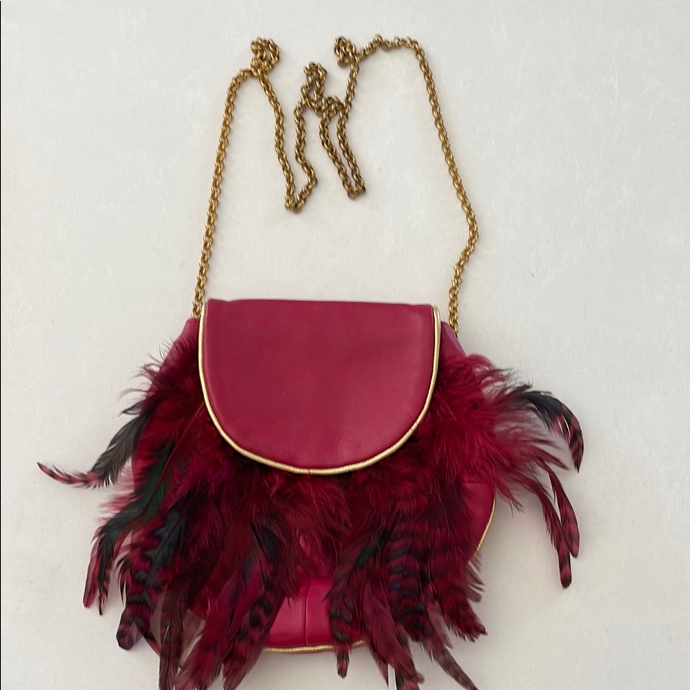 OLIVIA CLERGUE PARIS.  Luxurious Red and Gold Crossbody Bag with Feather Accents